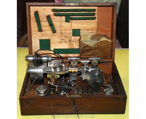 A wooden cased ''B.T.M. Watchmaker's Lathe - manufactured by British Tabulating Machine Co. Ltd., Letchworth for E.H. Jones (
