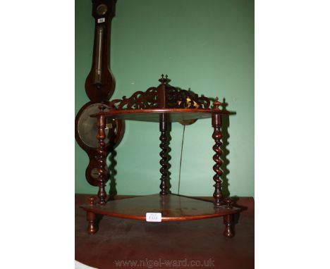 A two tier Rosewood corner shelf with barley twist support and fretcut top