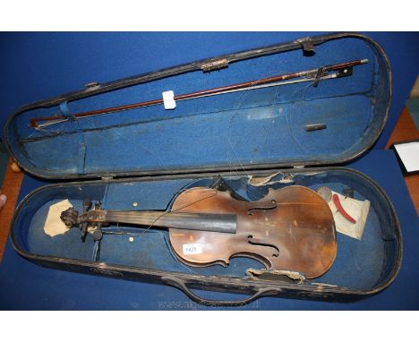 An ebonised wood violin case containing a Violin, a printed label within stating ''Copy Antonius Stradivarius Cremonensis'', 