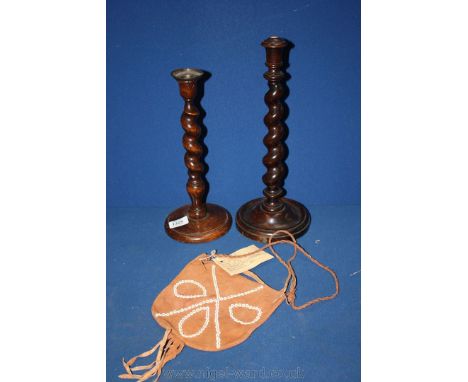 A barley twist wooden Lamp base and Candlestick together with a small suede bag, beaded Craft made from hatched ostrich eggs,