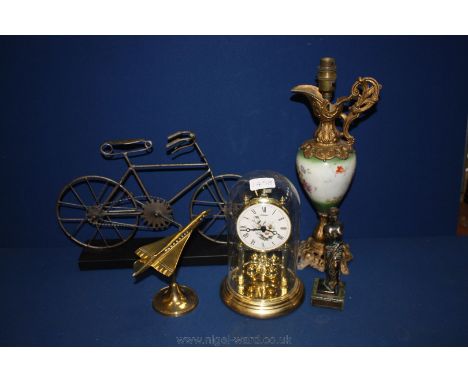 A quantity of miscellanea including metal bicycle model, small brass model of Concorde, modern Anniversary Clock, Ewer conver