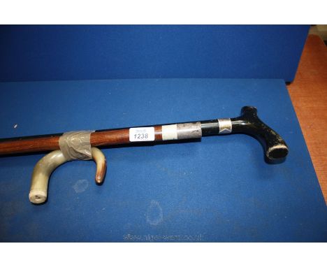 A horn handled Walking Stick with silver band a/f plus another stick.
