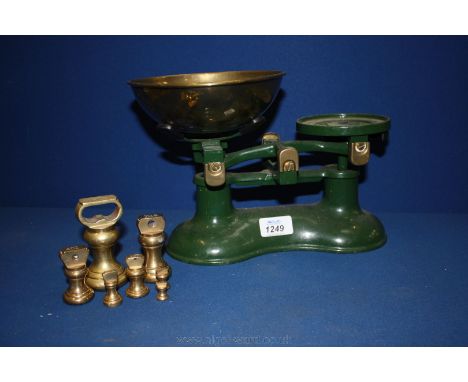 A set of Victor cast iron Kitchen Scales and weights