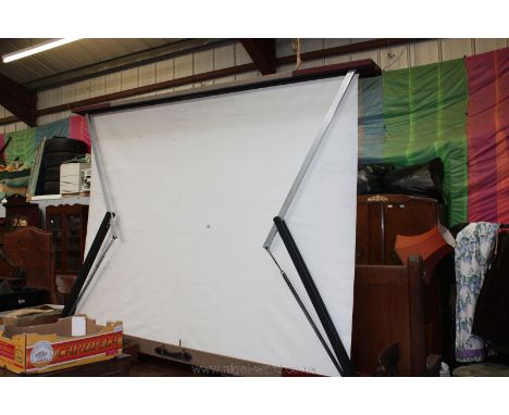 A vintage cased Celfux self sprang canvas projector screen.