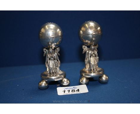 A pair of figural Salts of three figures holding a globe, with Russian hallmarks, one hinge a/f.
