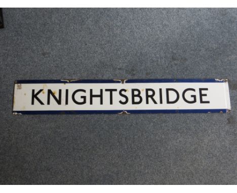 A original vintage London Underground station sign: KNIGHTSBRIDGE. Approx. size: 23 X 139.5CM. PLEASE NOTE THAT THIS ITEM IS 