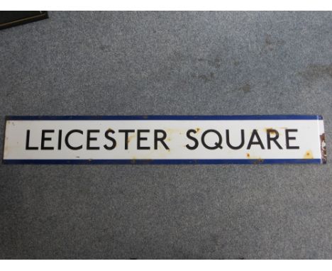 A original vintage London Underground station sign: LEICESTER SQUARE. Approx. size: 45 X 159CM. PLEASE NOTE THAT THIS ITEM IS