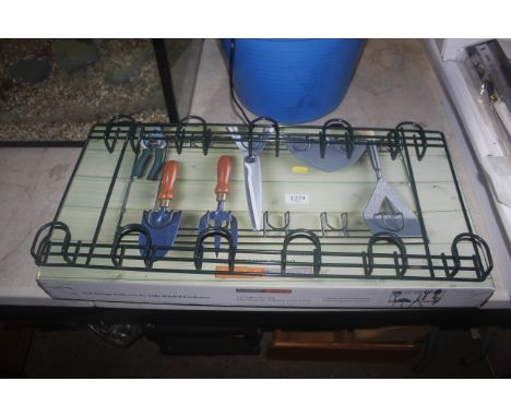 A wall mounting garden tool hanging rack with original box