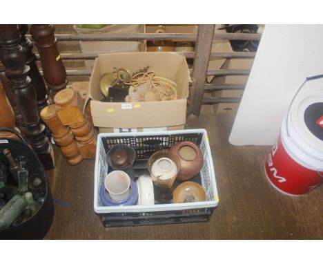 Two boxes containing various items to include glass and stoneware vases, bottles, brass chamber stick, metal vintage tin etc.