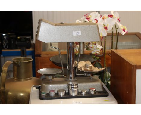 A set of bank scales and weights