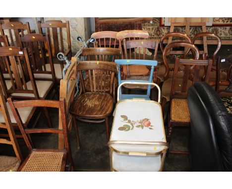 A three tiered tea trolley, a blue painted bar back chair, a pair of stick back dining chairs, three other chairs and a stora
