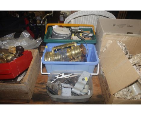 Three boxes containing various items to include galvanised hinges, various metal ware, a Dietz hanging oil lamp, a staple gun