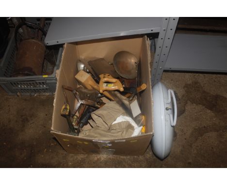 A box containing various items to include hand saws, vintage bed warmer (sold as a collectors item), balance scales, blow tor