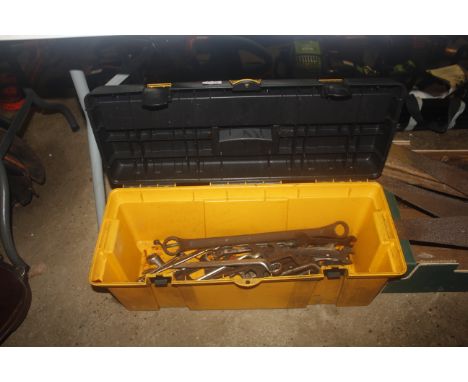 A plastic tool chest and contents of various spanners 