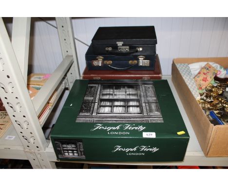 A Joseph Verity of London brown leather briefcase and three suitcases 