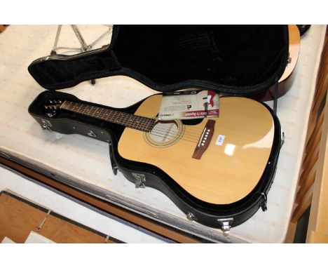 A Squier by Fender acoustic guitar Model No.SA-50, serial No.CFS1307815 in fitted case