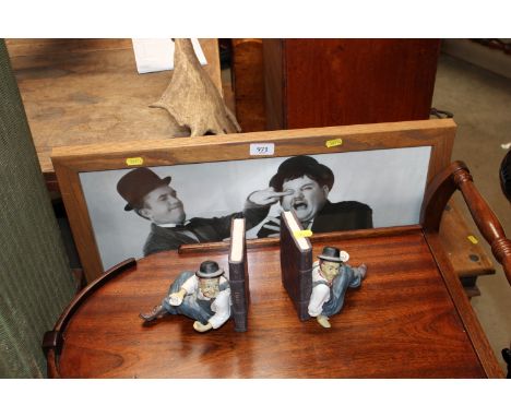 A pair of Laurel &amp; Hardy bookends and a Laurel &amp; Hardy framed print