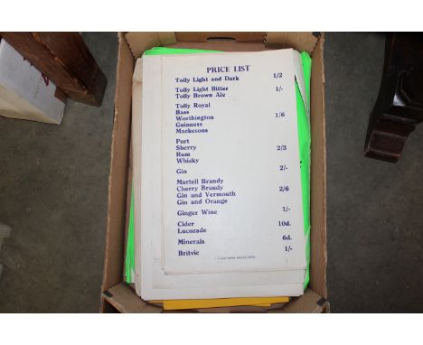 A box containing vintage shop and pub price list posters including Tolly Cobbold 