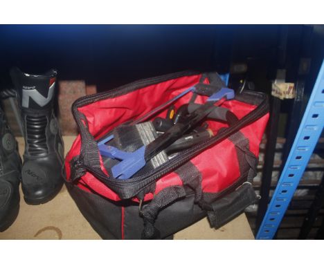 A tool bag and contents of tools to include decorators brush, Draper hand saw, smoothing plane, mole grips, hammers etc.
