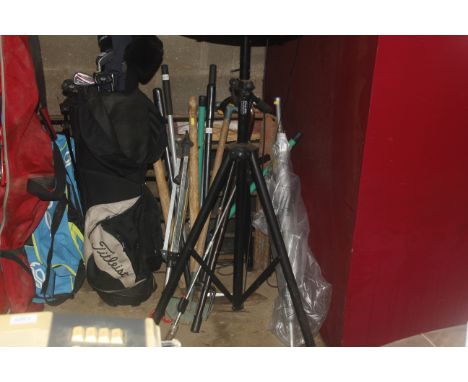 A quantity of various items to include walking sticks, digging fork, garden shears, umbrella etc.