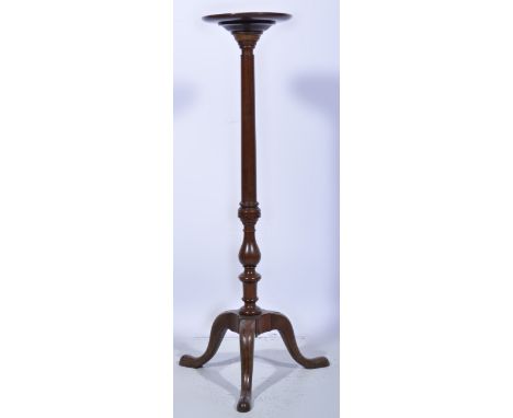 Mahogany jardiniere stand, ringed column with baluster under section, tripod legs, height 115cm.