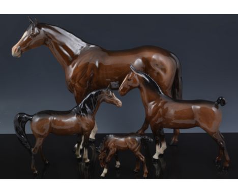 Beswick model of a large racehorse, chestnut coloured, 29cm, and six other Beswick models of chestnut horses and foals (7).