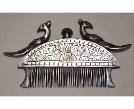 Indian white metal beard comb, engraved frame, modelled with two Peacocks, width 8.5cm.