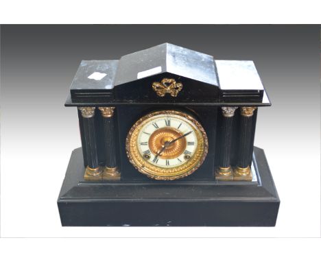 Victorian black metal mantel clock, architectural pediment with columns, ivorine chapter ring, American spring driven movemen