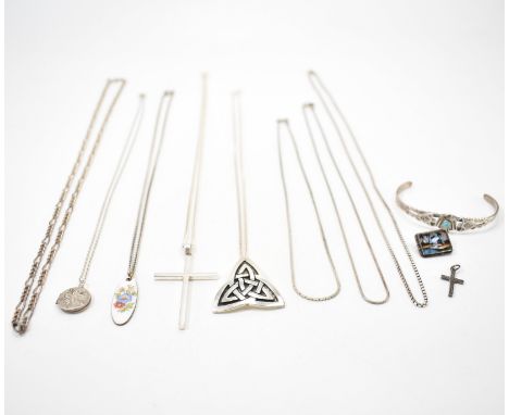 An assortment of silver jewellery to include a hallmarked Celtic pendant necklace, a Native American eagle bangle bracelet se