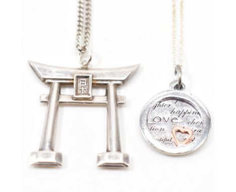 A silver Chinese pendant necklace having a flat link chain with Chinese temple pendant, together with a silver pendant neckla