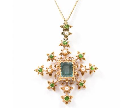 A 19th Century antique gold, tourmaline, demantoid garnet pearl cannetille crucifix&nbsp; pendant necklace. The pendant being