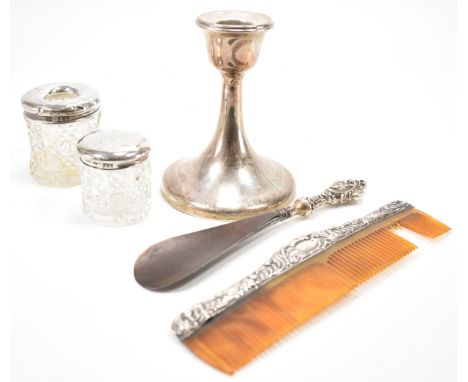 A selection of silver hallmarked dressing table items. The lot to include a repousse decorated silver comb (hallmarked Birmin