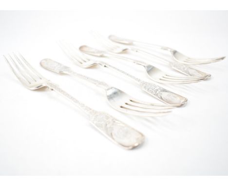 A set of six Edwardian antique silver hallmarked fiddle pattern forks. The fork all having engraved floral detailing with ini