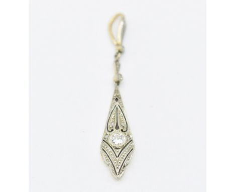 An Art Deco gold and diamond necklace pendant. The pendant in the form of a pierced diamond shaped lozenge having a bezel set