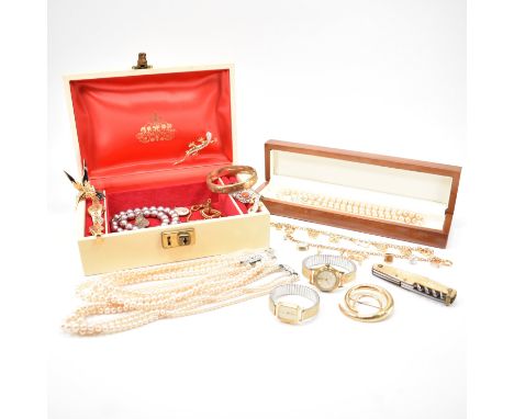 A collection of vintage costume jewellery. The lot to include simulated pearl necklaces including Lotus, two yellow metal cha