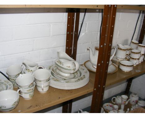 A quantity of Royal Doulton Tonkin together with a Paragon Athena coffee and tea service on two shelves