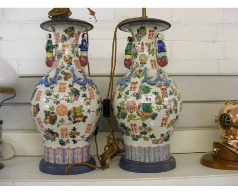 A pair of Chinese lamp vases 