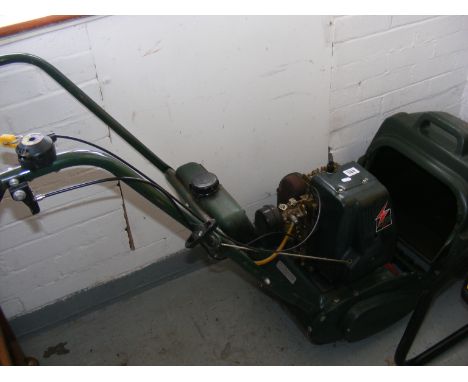 An ATCO electric ignition petrol rotary lawn mower 