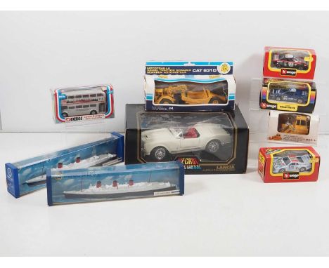A mixed group of diecast vehicles including cars, ships etc by BBURAGO, CORGI and others - VG in G/VG boxes (9)