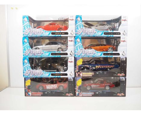 A group of 1:18 scale MAISTO diecast cars, all Playerz or Marvel Editions, all as new in boxes - VG/E in VG/E boxes (8)