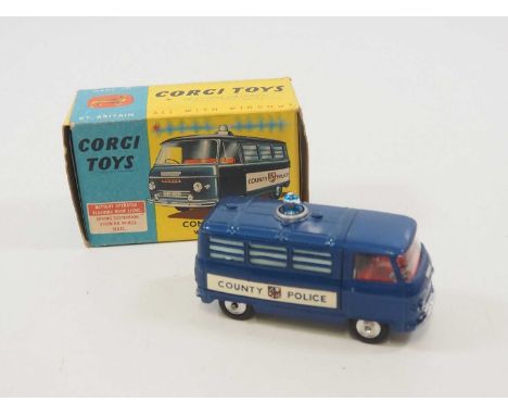 A CORGI 464 Commer Police Van with flashing light - VG in VG box
