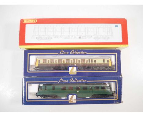 A group of OO gauge diesel railcars comprising a LIMA ex-GWR example in BR green, a LIMA class 121 in BR(W) chocolate/cream a