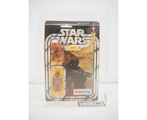 STAR WARS: A PALITOY Star Wars Jawa figure with rare Vinyl Cape on original 12-back card (SW-12B) from the first year of prod