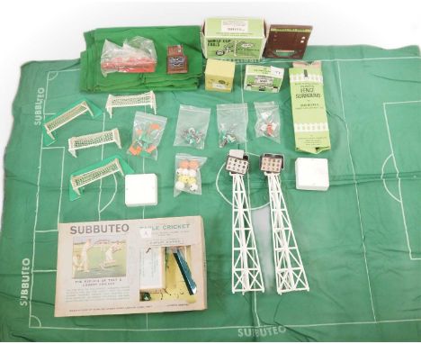 A group of SUBBUTEO football game accessories including two pitches, floodlights and other accessories, some in original boxe