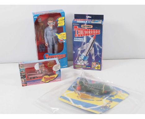 A group of Gerry Anderson Thunderbirds toys comprising a MATCHBOX Electronic Thunderbird 1, a VIVID IMAGINATIONS talking BRAI
