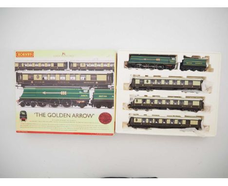 A HORNBY R2369 OO gauge 'The Golden Arrow' train pack comprising Battle of Britain class steam locomotive together with 3x Pu