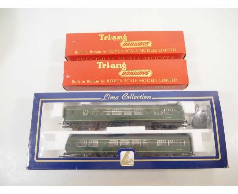 A LIMA OO gauge class 101 2 car DMU in BR green livery together with a TRI-ANG 2 car suburban EMU in BR(S) green - G/VG in G/