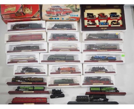 A diverse group of diecast models including MATCHBOX Yesteryear special issue sets and ATLAS 1:76 scale static steam locomoti