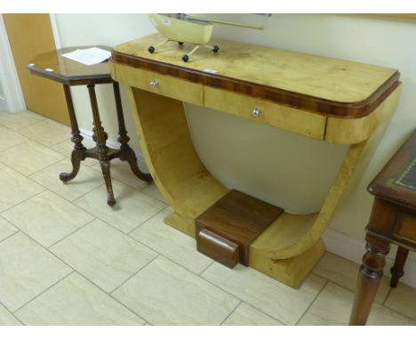 An Art Deco style Console Table in walnut and bird’s eye maple type veneer fitted two short drawers on U support and platform
