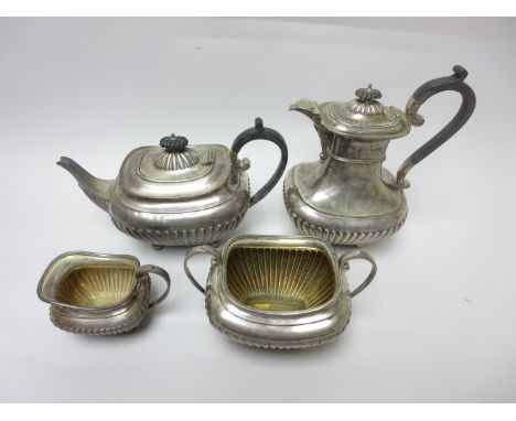 A George V silver four piece Tea Service of semi-fluted boat shape on ball feet, Sheffield 1923/4